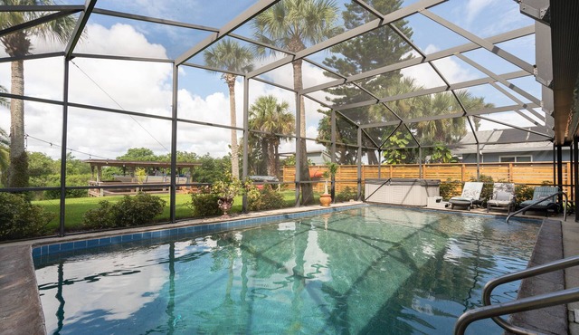A Fisherman's Dream! Large Pool, Hot Tub, Canal front, Private Dock, a Must See!