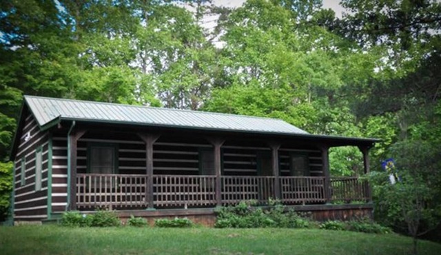 A little mountain cabin in the woods.