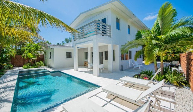 Beautiful AMI Beach House with Pool and Fenced Backyard, Dog Friendly!