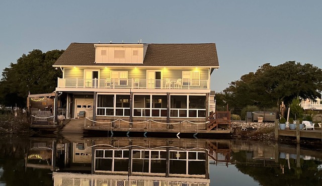 Beautiful home in quiet beach neighborhood on canal. Five minute walk to beach.