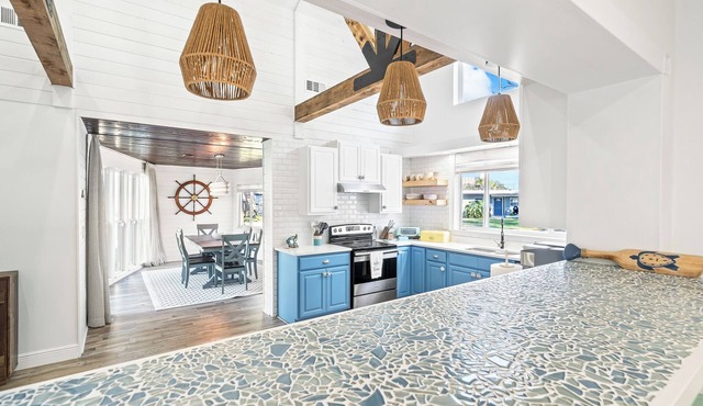 Breezy Waterfront Pool House Steps from the Beach!
