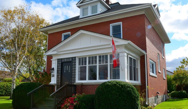 Century old 4 bedroom red brick home located in the Prettiest Town in Canada
