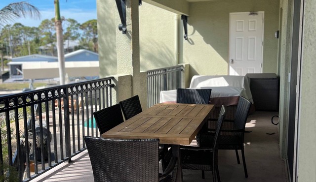 Charming 3-bedroom 2.5-bath condo on a canal with elevator and pool!