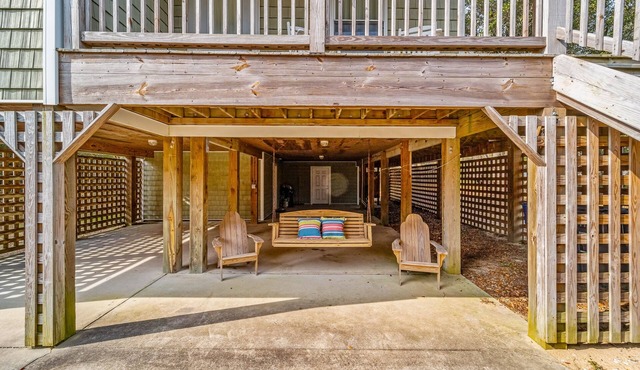 Charming home with wraparound balcony, central AC, full kitchen, & W/D