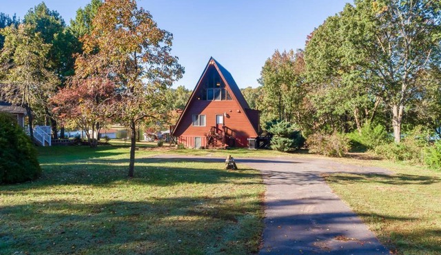 Charming, lakefront A-frame with private dock, lakeside gazebo, spacious deck