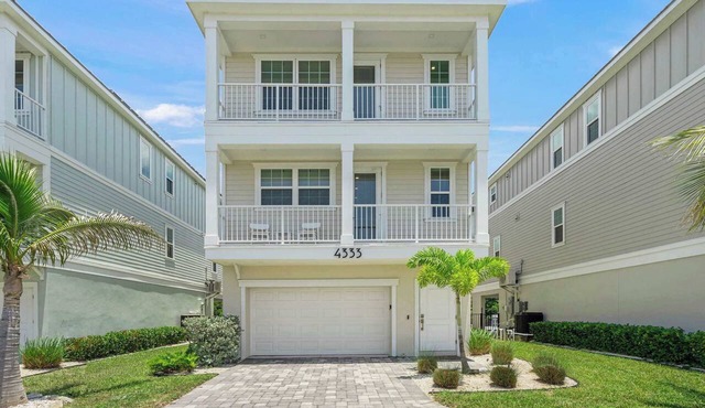 Coastal Escape at Hunters Point. A Luxury Waterfront Pool Home by Mainsail Vacation Rentals