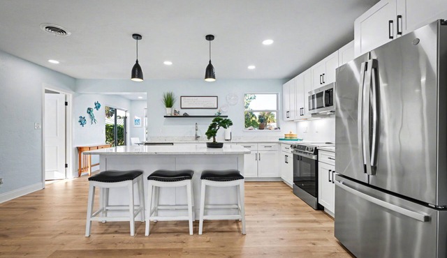 Coral Way Getaway 3/2 Sleeps 8 Walk to Beach Near Speedway and Airport