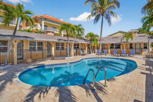 Enjoy Sunny Days by the Pool and Beautiful Sunset Beach Walks at Coconut Villa's Suite 10!