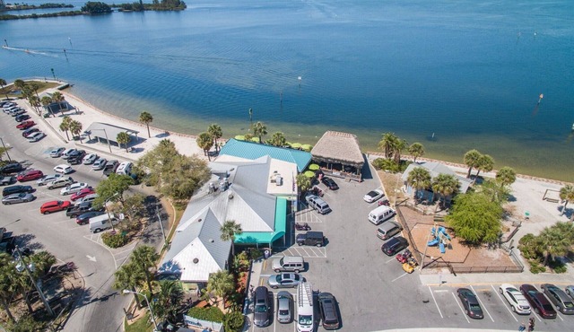 Gulf access. Kayaks. Hammocks. Corn hole. Giant Jenga. Paddle-board.