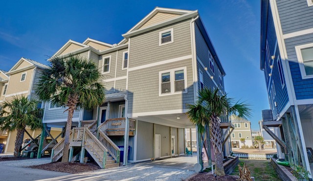 High-end duplex with many amenities, just a short walk to the beach or sound.