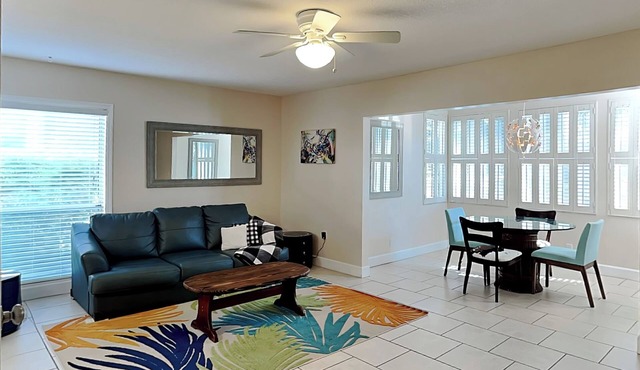Modern First-floor Condo with Pool, Porch, Beach Access.