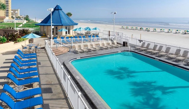 One Suite w/Balcony | Outdoor Pool Access | Tiki Bar | Free Parking