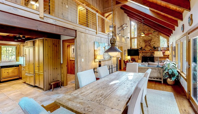 Open & spacious mountain home with hot tub, large deck, fireplace, & ski view