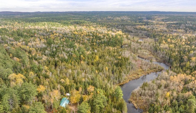 Peaceful Riverfront Cabin on 43 Private Acres
