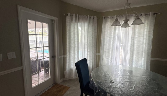 Serene 3-bedroom house with AC and inground pool in charming Spring Hill/Tampa