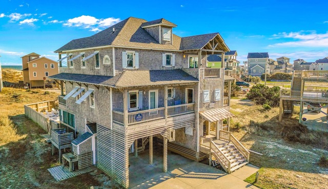 Sprawling & luxe home with pool, hot tub, balconies, grill, game room, & AC