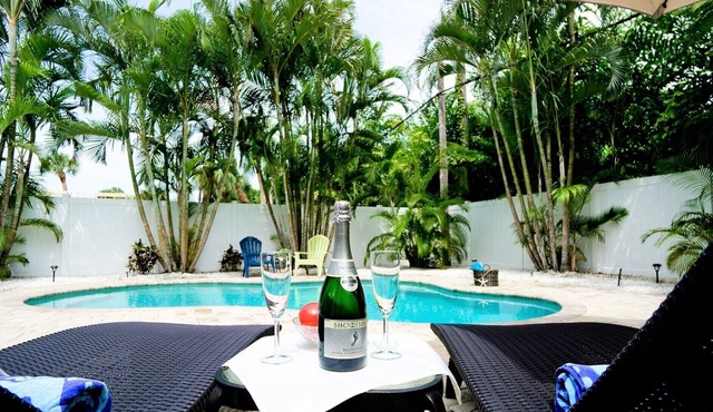 Sunbreeze – Tropical Poolside Living Just Steps from the AMI Beaches