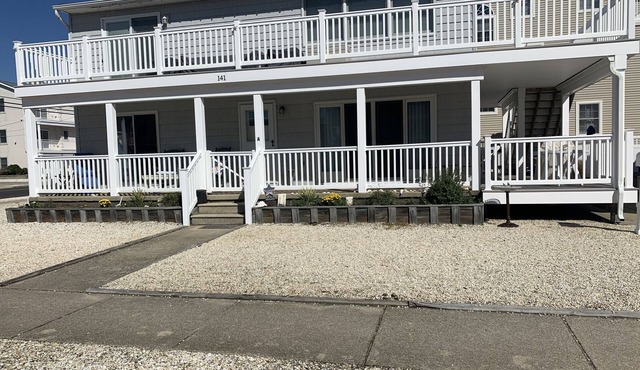 Views! Big wrap around deck w/views of the bay & sunset & still close to beach!