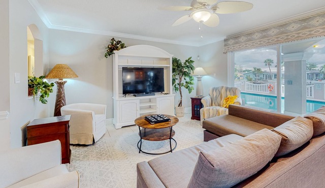 Waterfront gem with pool, boat lift & outdoor living - near beach - dog-friendly