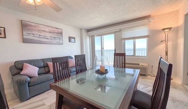 Your Modern Beach Condo Awaits! Sun & Dolphins
