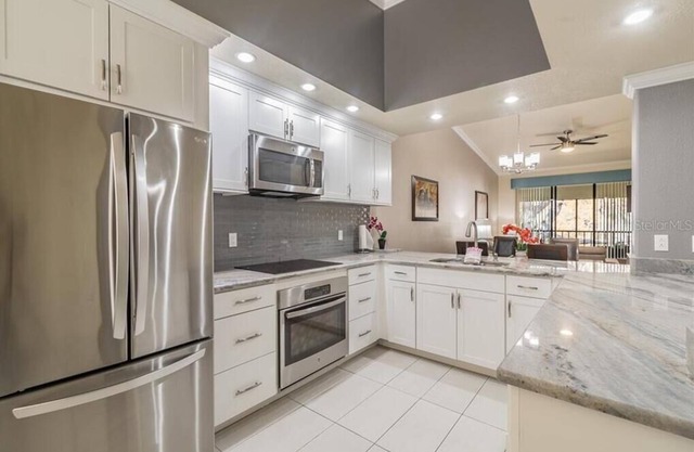 Luxury Shorewalk lakefront condo close to the AMI and IMG.