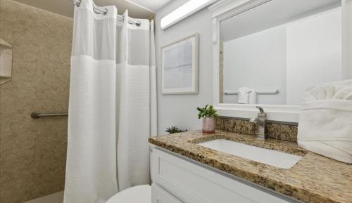 Deluxe Two-Bedroom Poolside Walkout Condo - Ground Floor - Unit #104