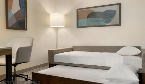 King Suite with Trundle Sofa - Hearing Accessible