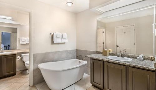Two-Bedroom Suite with One King Bed, Two Double Beds and Sofa Bed