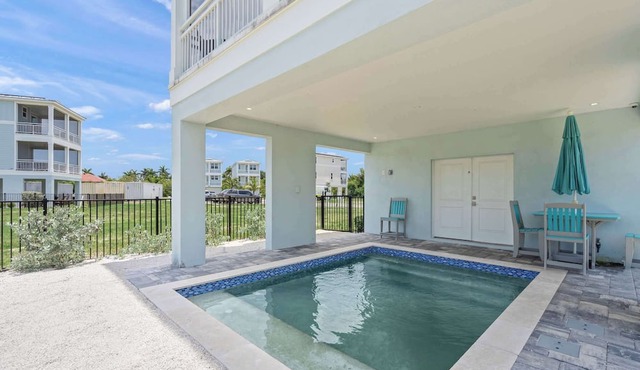 Baydream Believer at Hunters Point. A Luxury Waterfront Resort Home by Mainsail Vacation Rentals